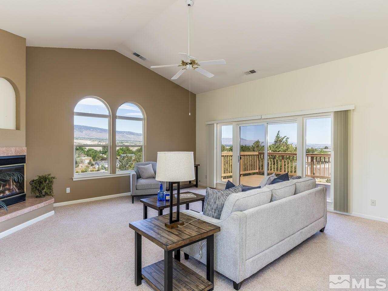 1090 Reese Way Reno, NV 89521 - Photo 12 of 33 a living room with furniture and a large window