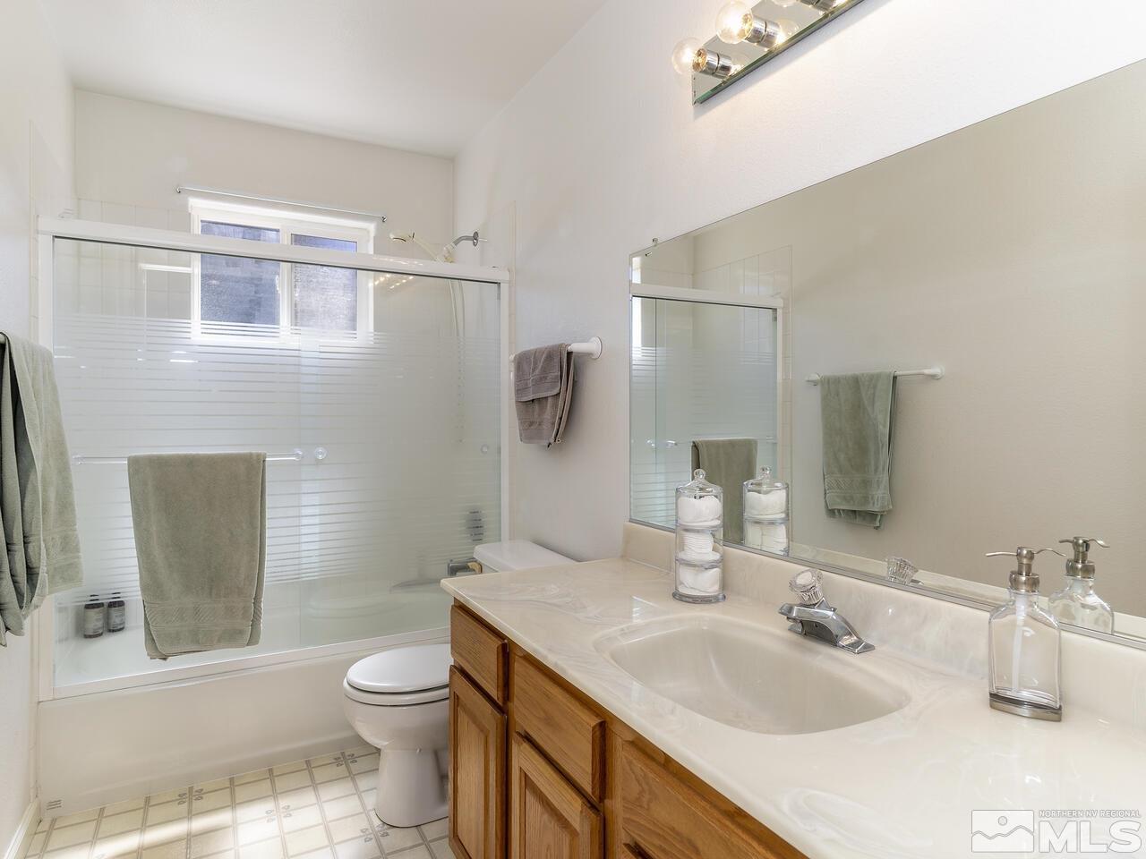 1090 Reese Way Reno, NV 89521 - Photo 22 of 33 a bathroom with a sink toilet and shower