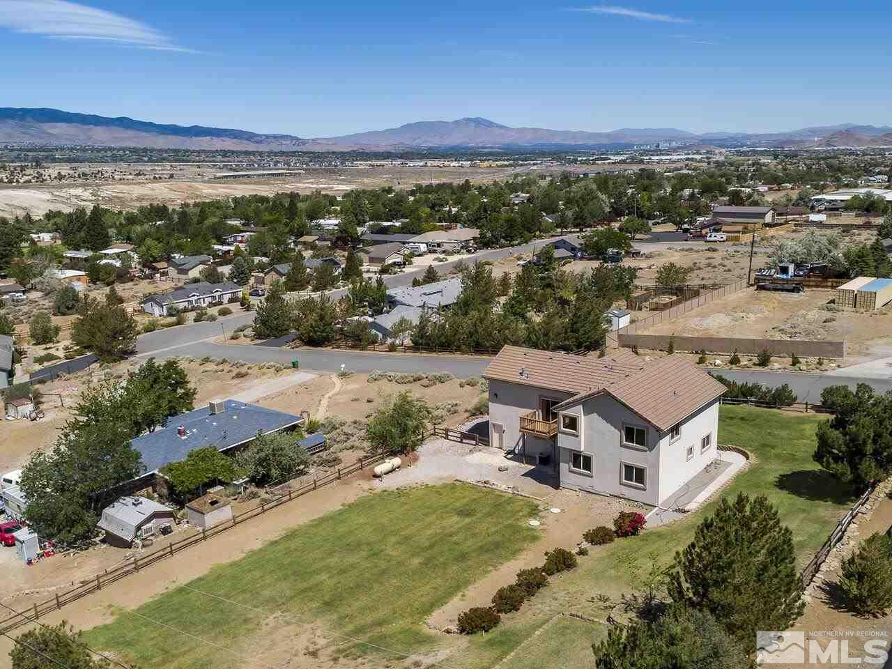1090 Reese Way Reno, NV 89521 - Photo 6 of 33 an aerial view of residential houses with outdoor space and ocean view