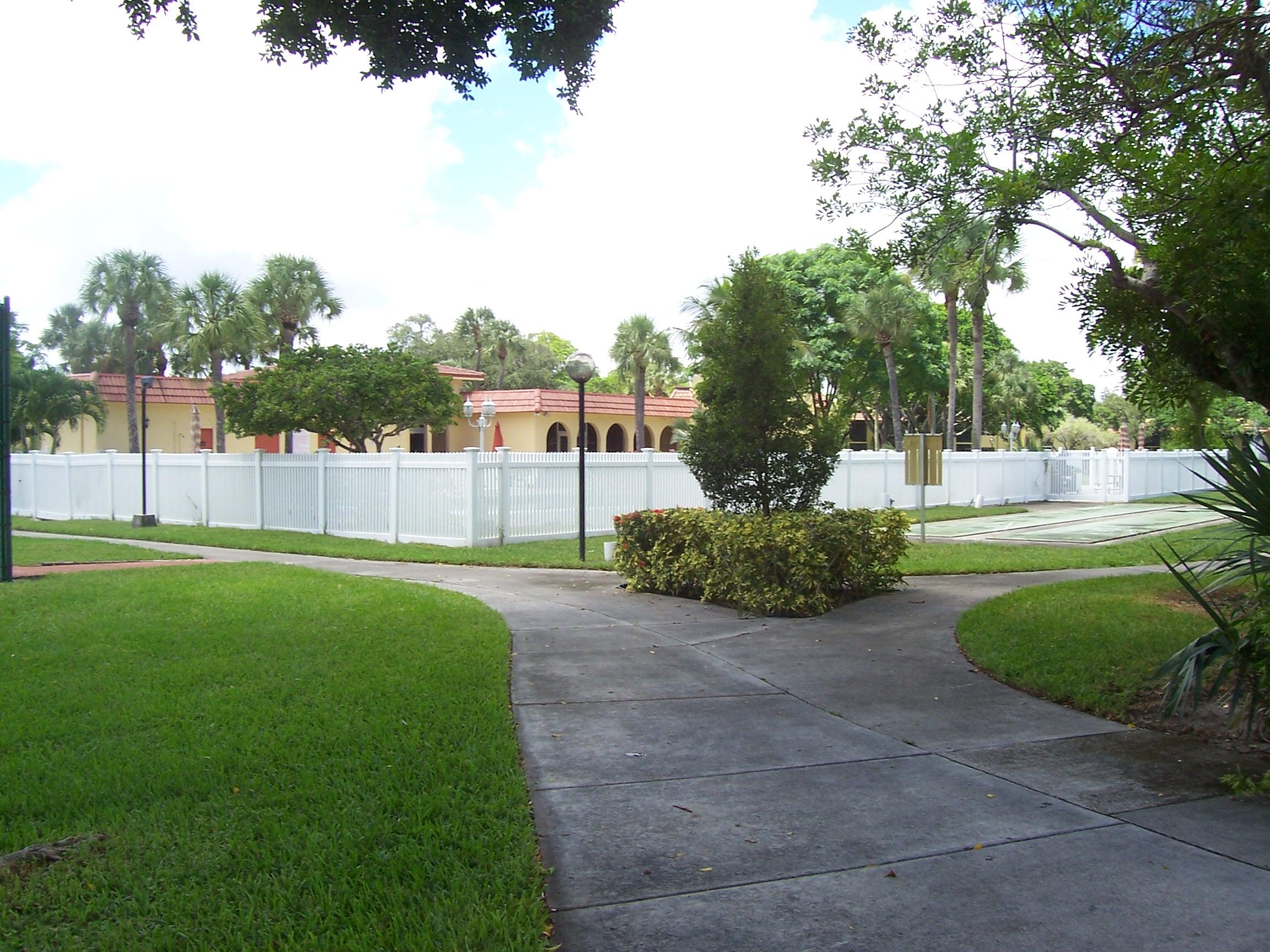 872 Southwest 9th St Circle, Unit 203 Boca Raton, FL 33486 - Photo 4 of 15 WALK AREA BY POOL