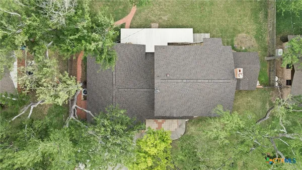 an aerial view of house with yard