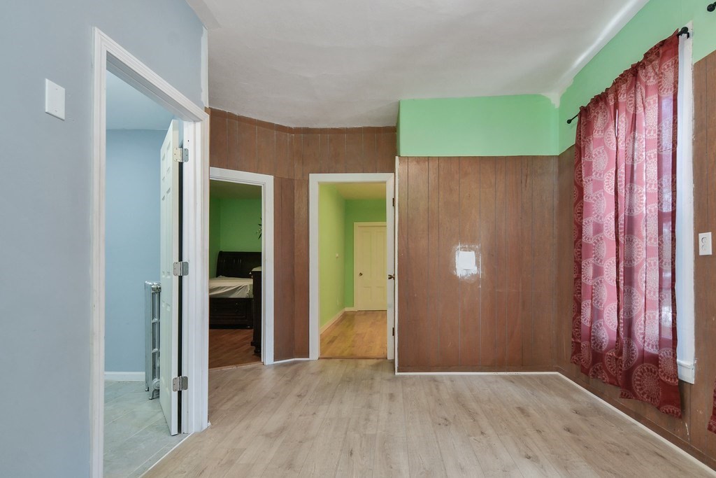 10 Holly Street Lawrence, MA 01841 - Photo 15 of 32 an empty room with closet and a closet