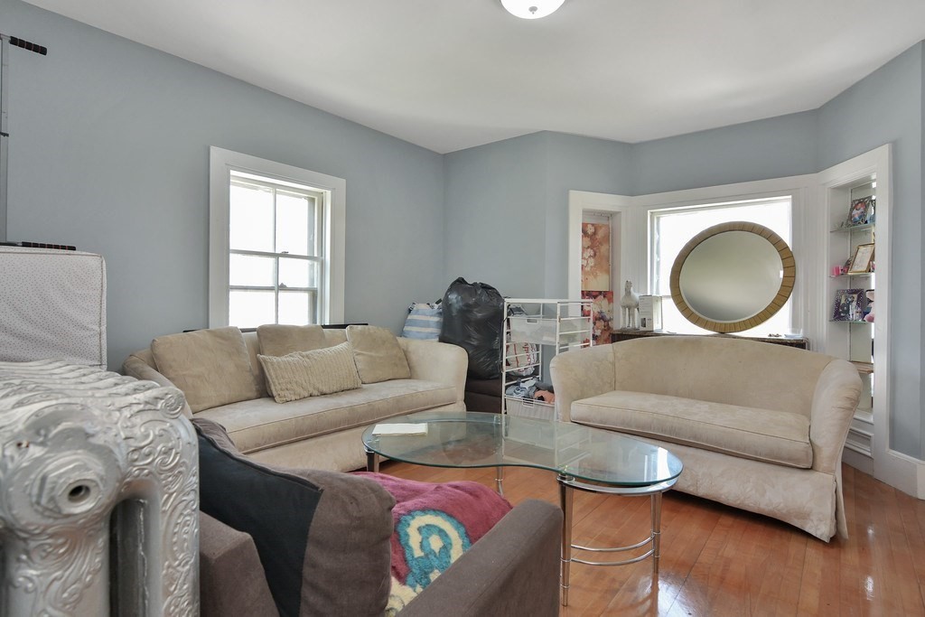 10 Holly Street Lawrence, MA 01841 - Photo 23 of 32 a living room with furniture and a window
