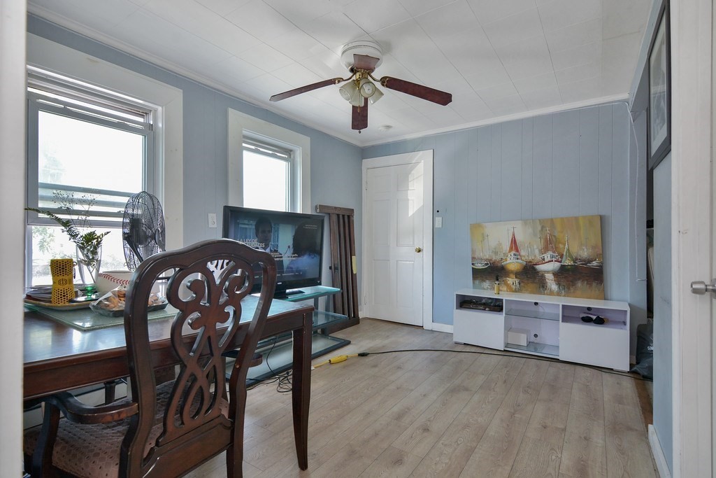 10 Holly Street Lawrence, MA 01841 - Photo 26 of 32 a view of a livingroom with furniture window and wooden floor