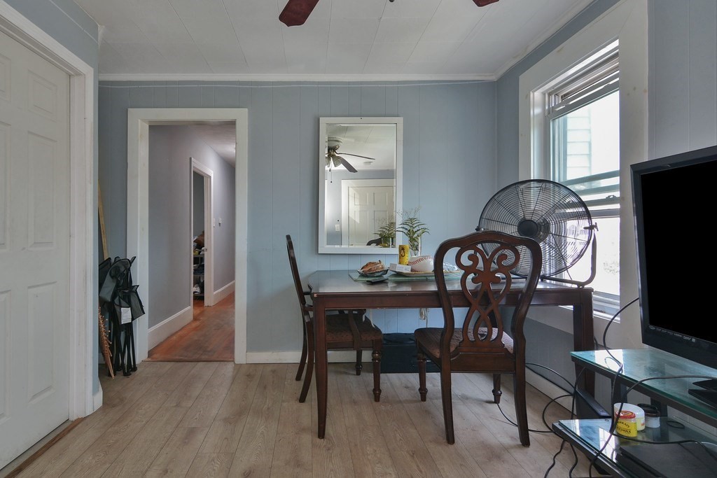 10 Holly Street Lawrence, MA 01841 - Photo 27 of 32 a view of a dining room with furniture and window