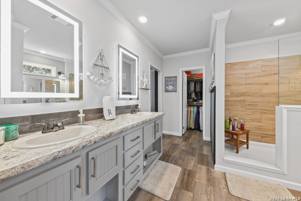 175 Ranch Country Drive La Vernia, TX 78121 - Photo 20 of 49 a spacious bathroom with a granite countertop sink mirror and a