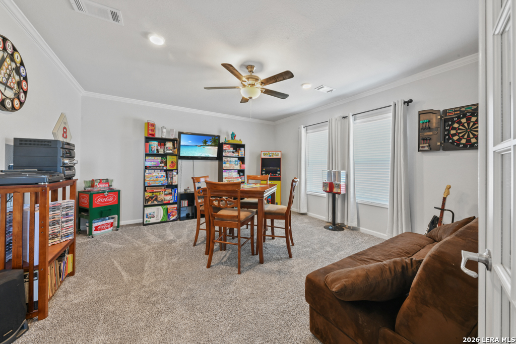 175 Ranch Country Drive La Vernia, TX 78121 - Photo 21 of 49 a living room with furniture and a flat screen tv