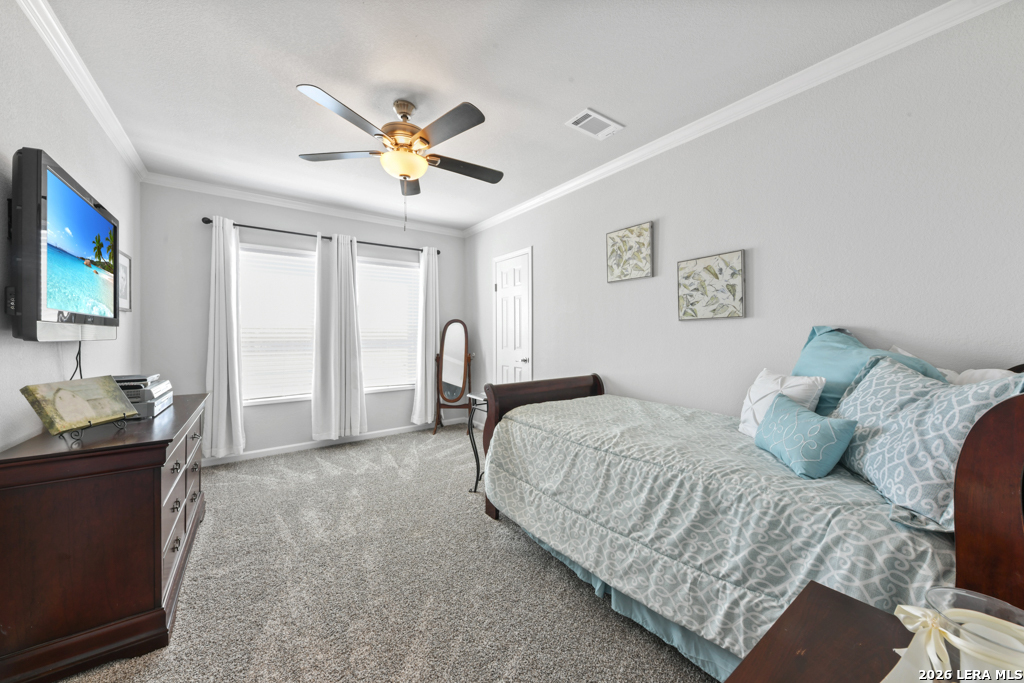 175 Ranch Country Drive La Vernia, TX 78121 - Photo 23 of 49 a bedroom with a bed and furniture