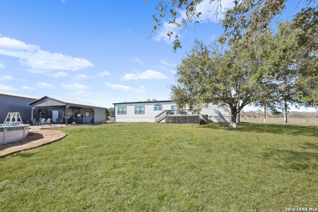 175 Ranch Country Drive La Vernia, TX 78121 - Photo 36 of 49 a front view of a house with a yard