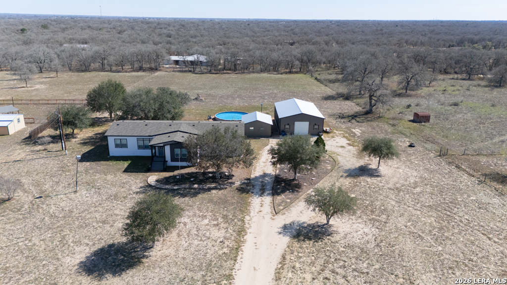 175 Ranch Country Drive La Vernia, TX 78121 - Photo 40 of 49 a view of a house with a yard