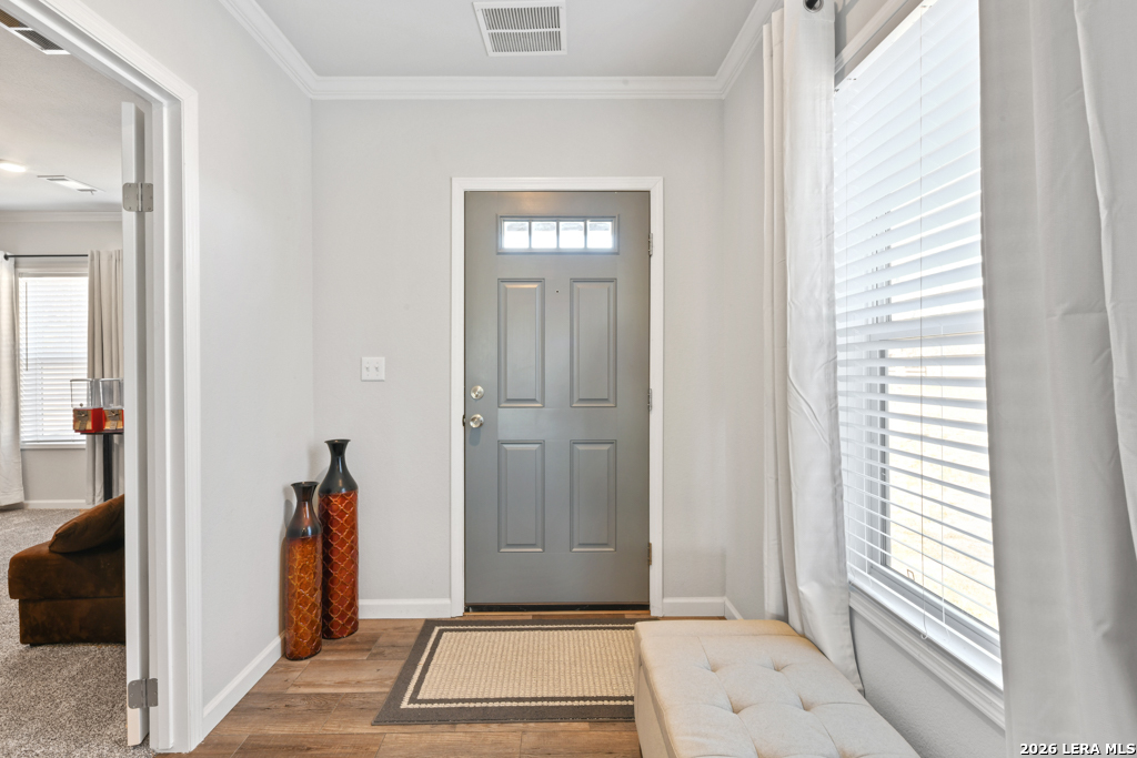 175 Ranch Country Drive La Vernia, TX 78121 - Photo 7 of 49 a view of a hallway with a livingroom and a window