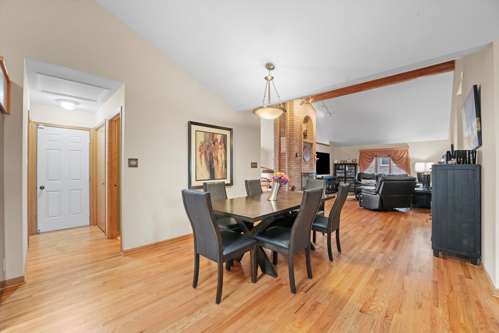 7428 Ridgefield Lane Tinley Park, IL 60487 - Photo 16 of 43 a view of a dining room with furniture and wooden floor