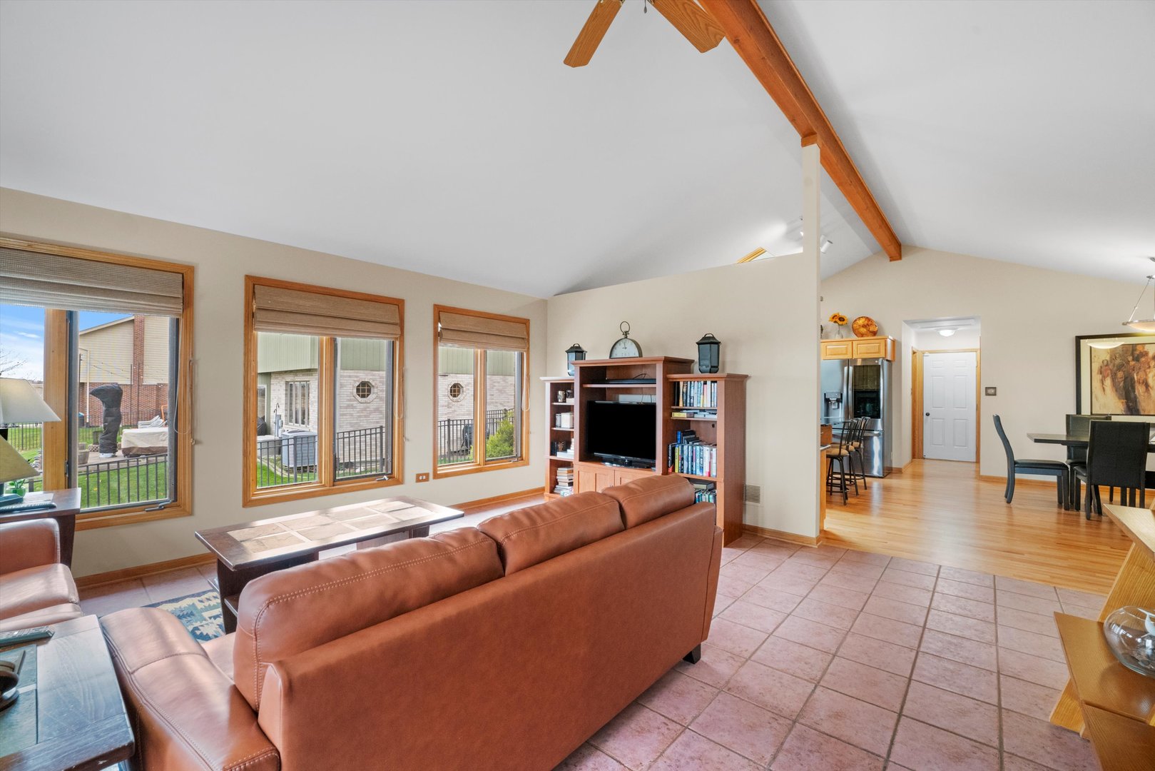 7428 Ridgefield Lane Tinley Park, IL 60487 - Photo 19 of 43 a living room with furniture and floor to ceiling windows