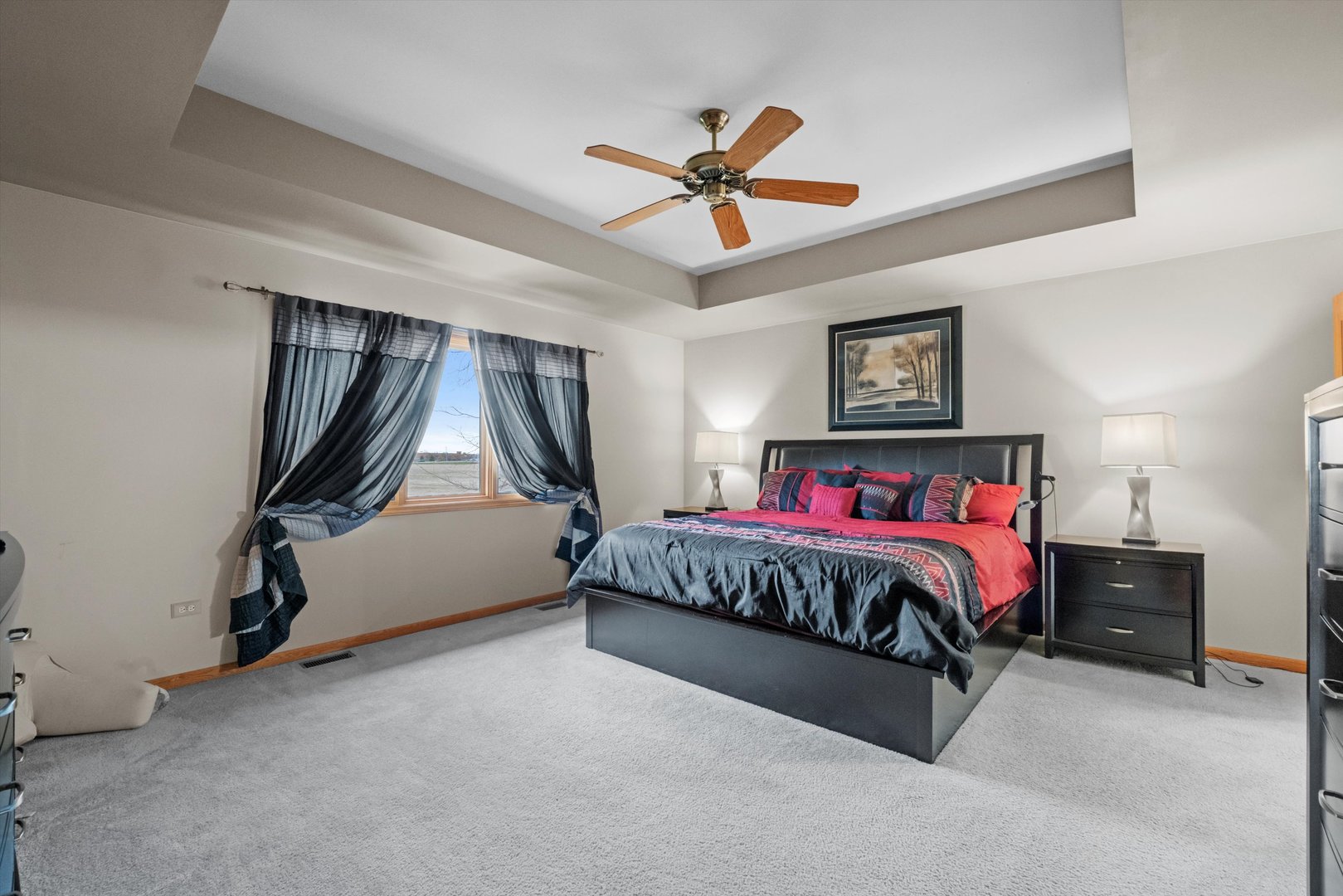 7428 Ridgefield Lane Tinley Park, IL 60487 - Photo 20 of 43 a bedroom with a bed and a ceiling fan