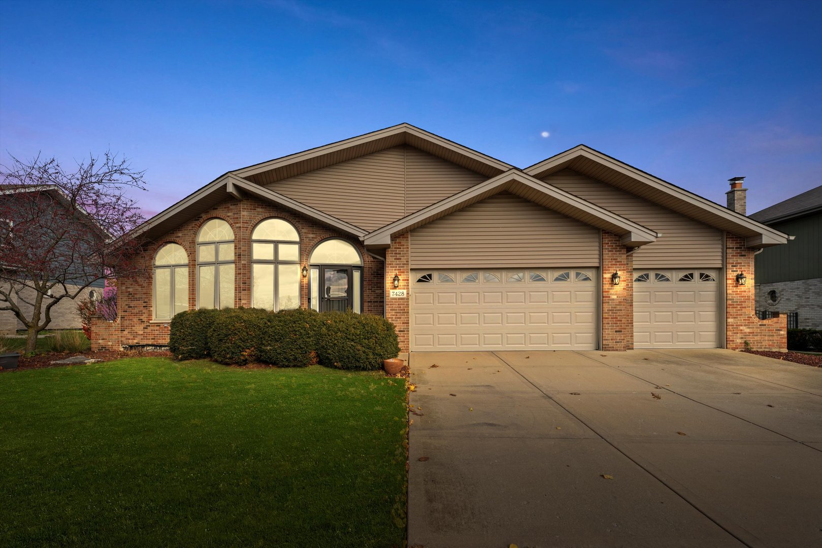 7428 Ridgefield Lane Tinley Park, IL 60487 - Photo 2 of 43 a front view of a house with yard and green space