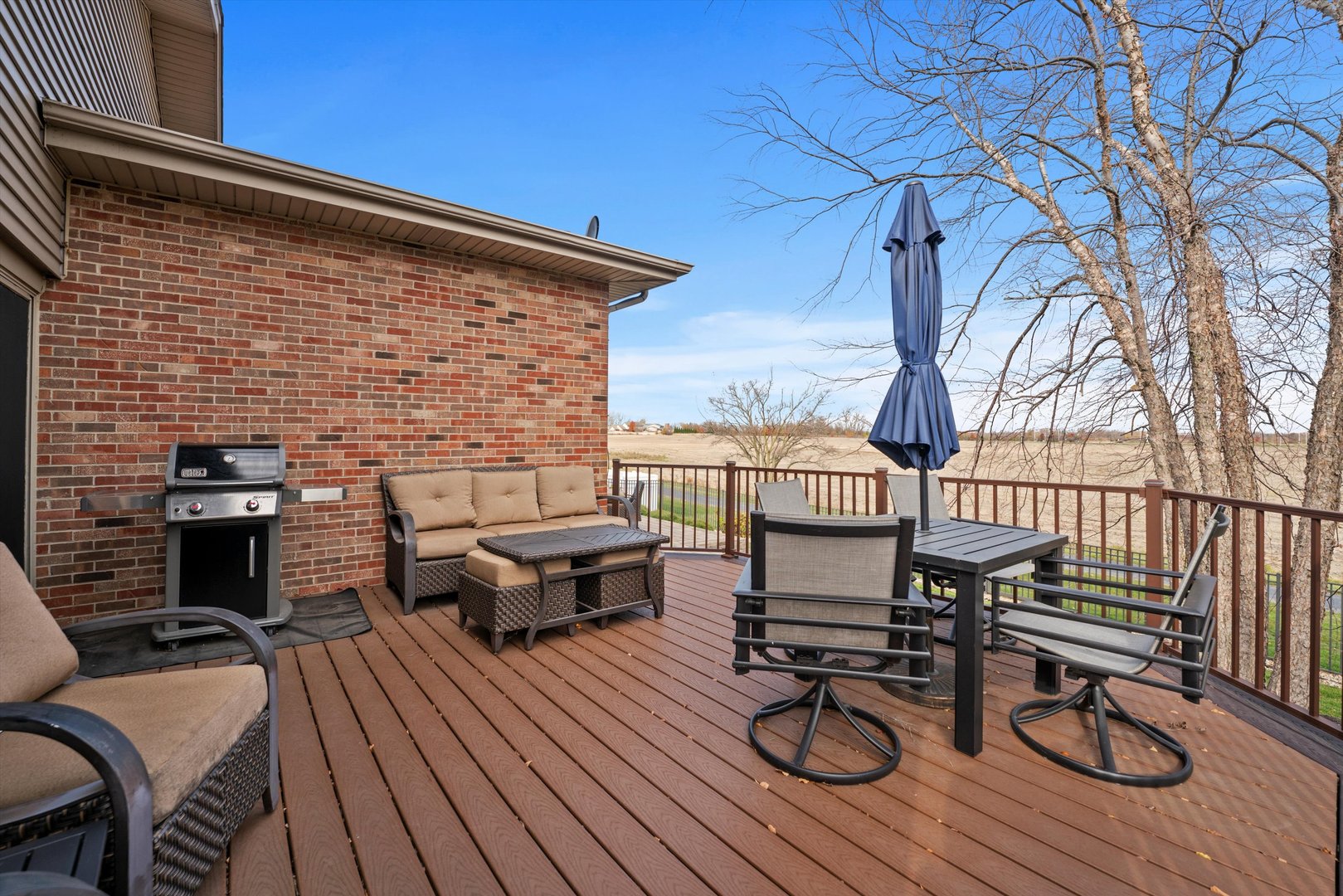 7428 Ridgefield Lane Tinley Park, IL 60487 - Photo 37 of 43 a view of roof deck with seating space and wooden floor