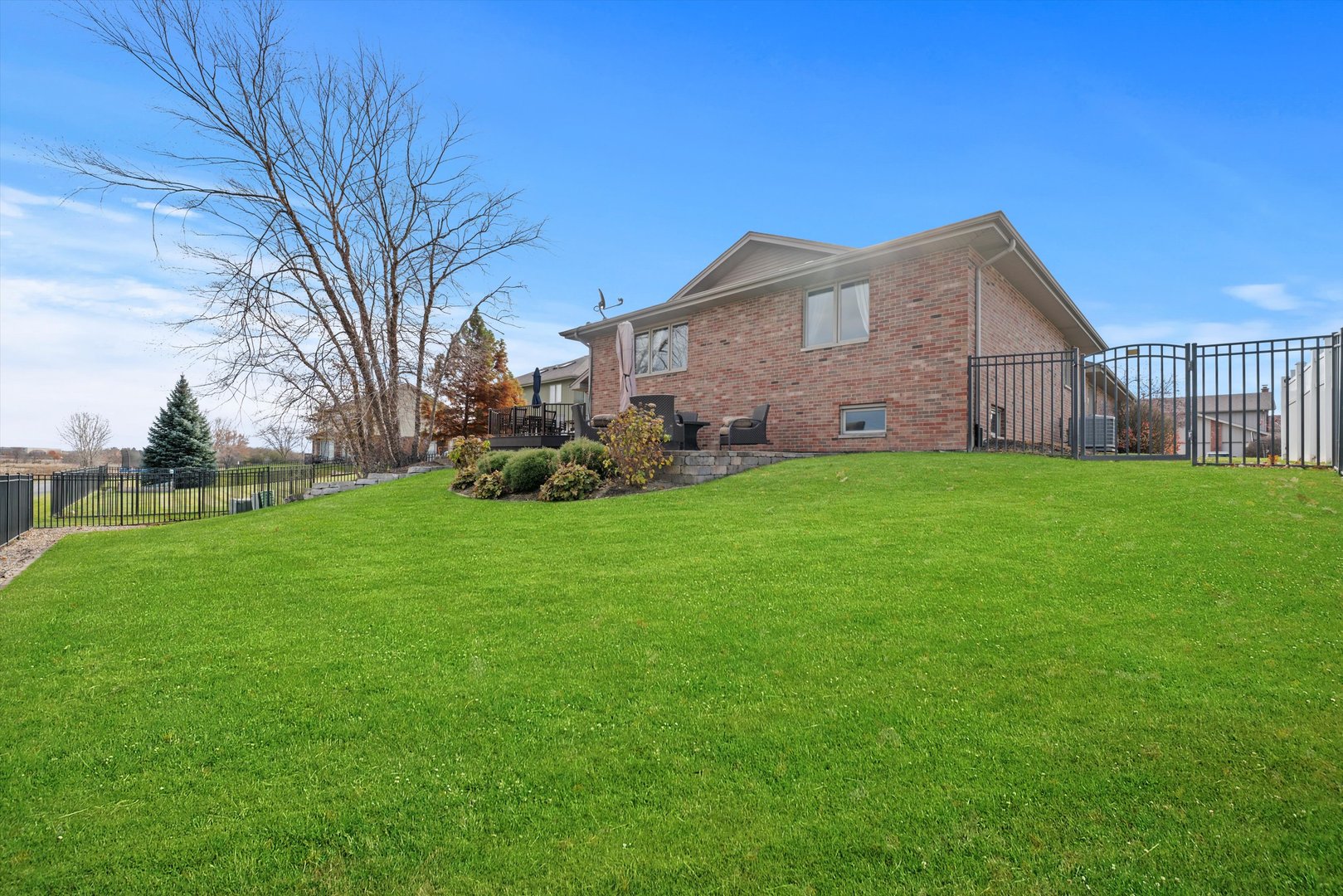 7428 Ridgefield Lane Tinley Park, IL 60487 - Photo 38 of 43 a view of a house with a yard