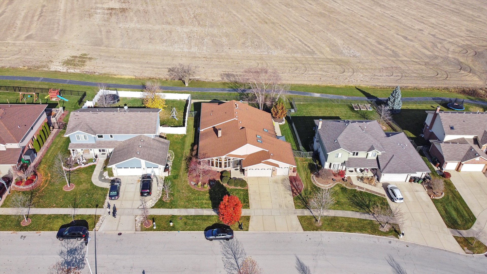 7428 Ridgefield Lane Tinley Park, IL 60487 - Photo 40 of 43 an aerial view of residential houses with outdoor space