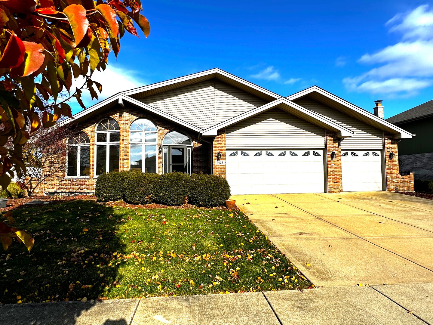 7428 Ridgefield Lane Tinley Park, IL 60487 - Photo 43 of 43 a front view of a house with a yard and garage