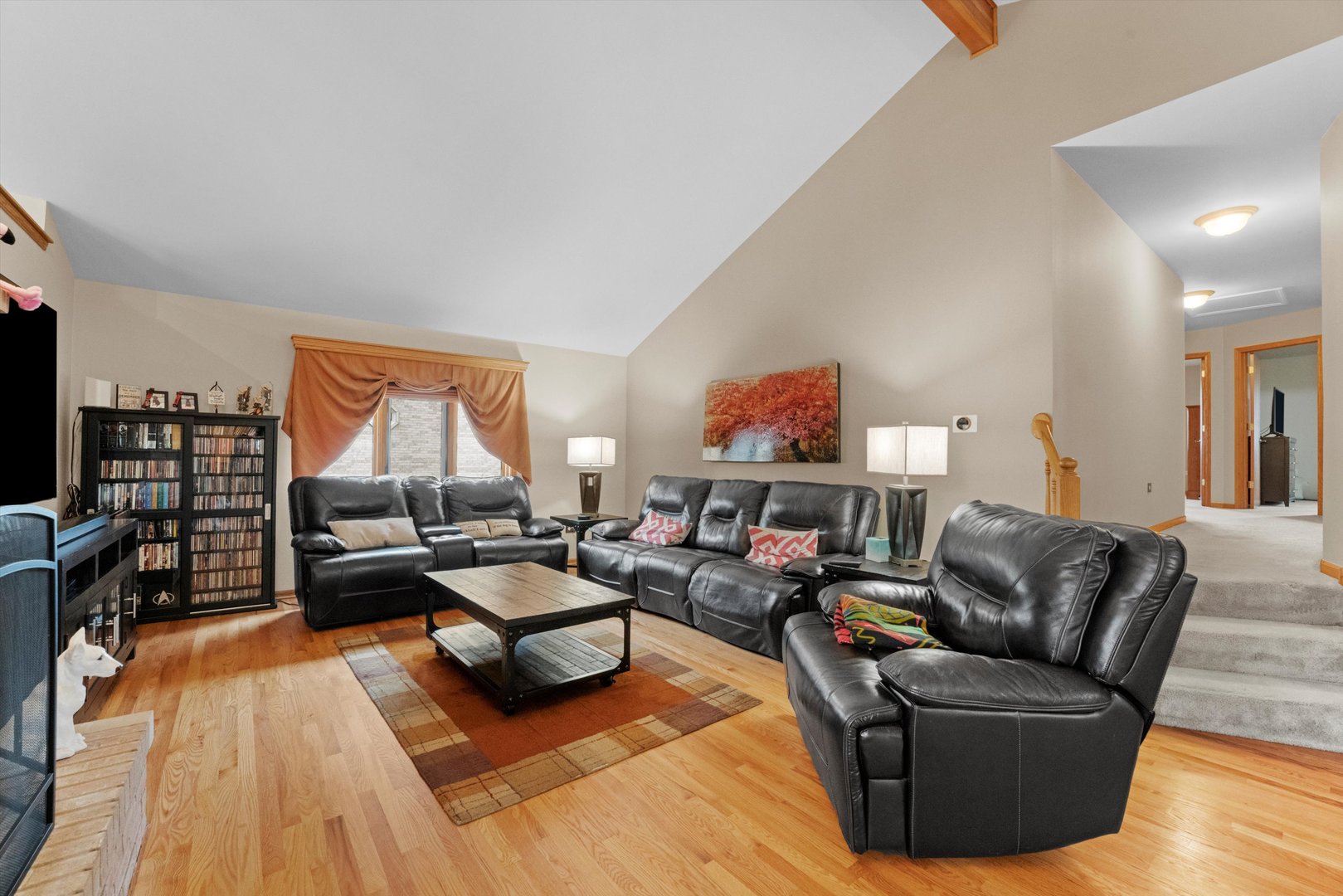 7428 Ridgefield Lane Tinley Park, IL 60487 - Photo 9 of 43 a living room with furniture and a wooden floor