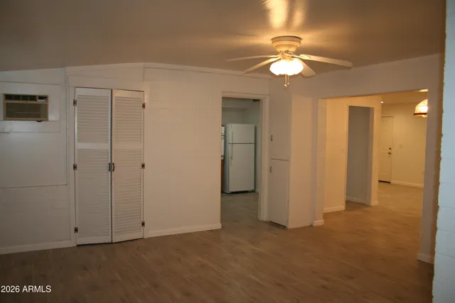 a white refrigerator freezer sitting inside of a kitchen