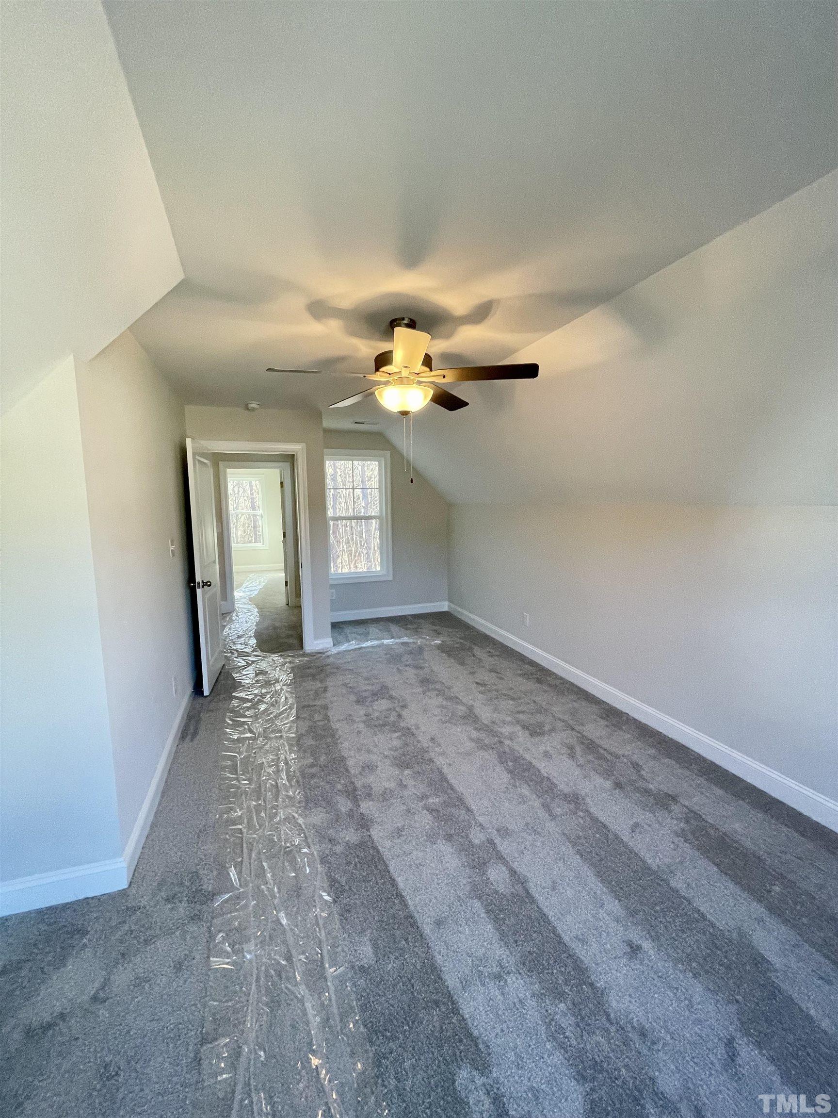35 Mulberry Road Spring Hope, NC 27882 - Photo 24 of 32 wooden floor in an empty room with a window
