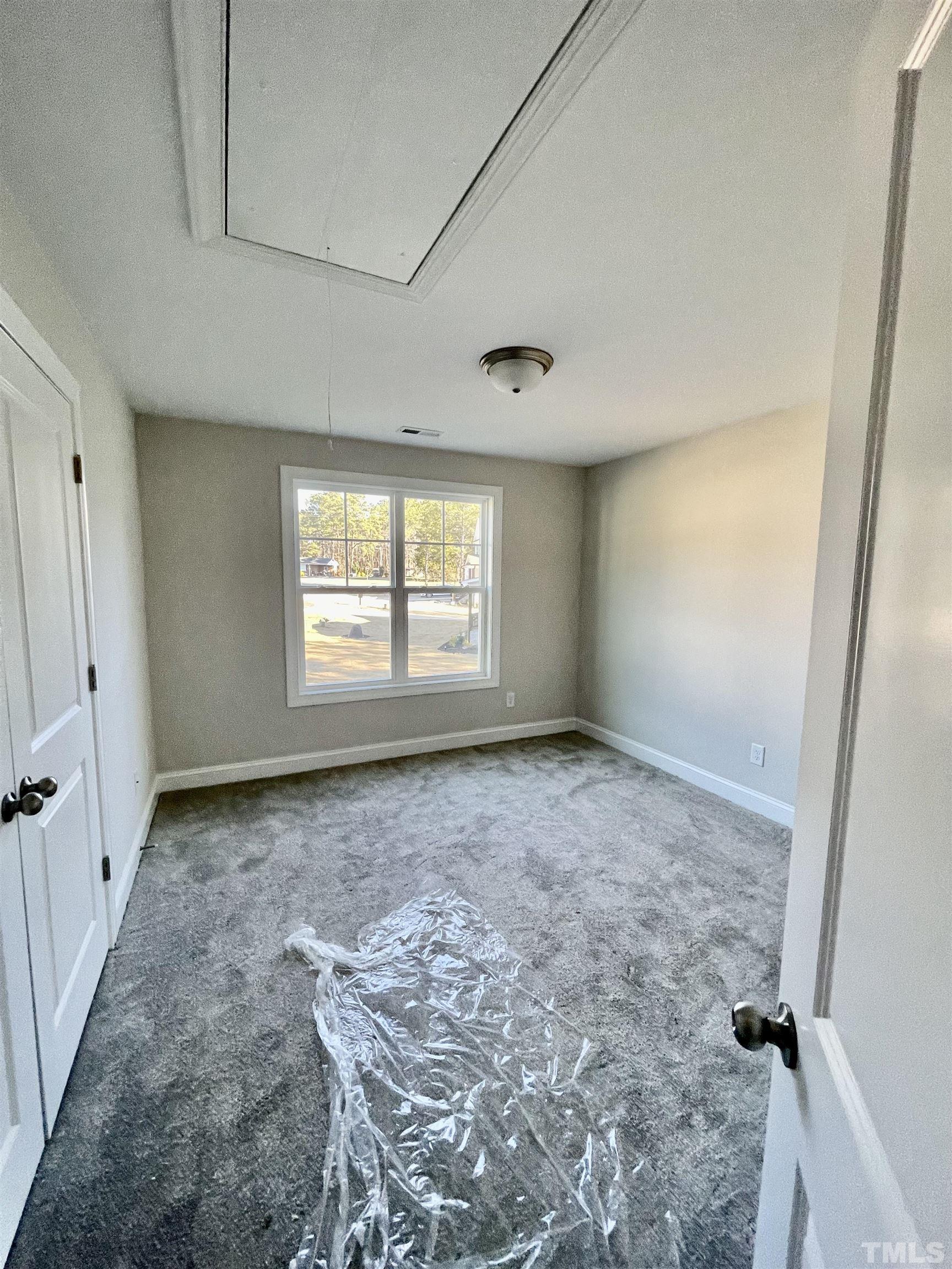 35 Mulberry Road Spring Hope, NC 27882 - Photo 30 of 32 an empty room with windows