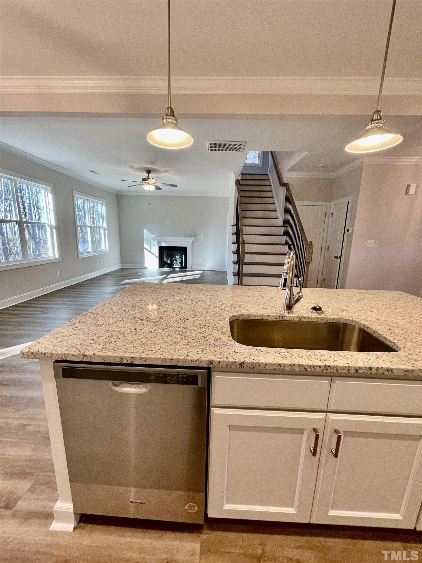 35 Mulberry Road Spring Hope, NC 27882 - Photo 7 of 32 a kitchen with a sink and a stove