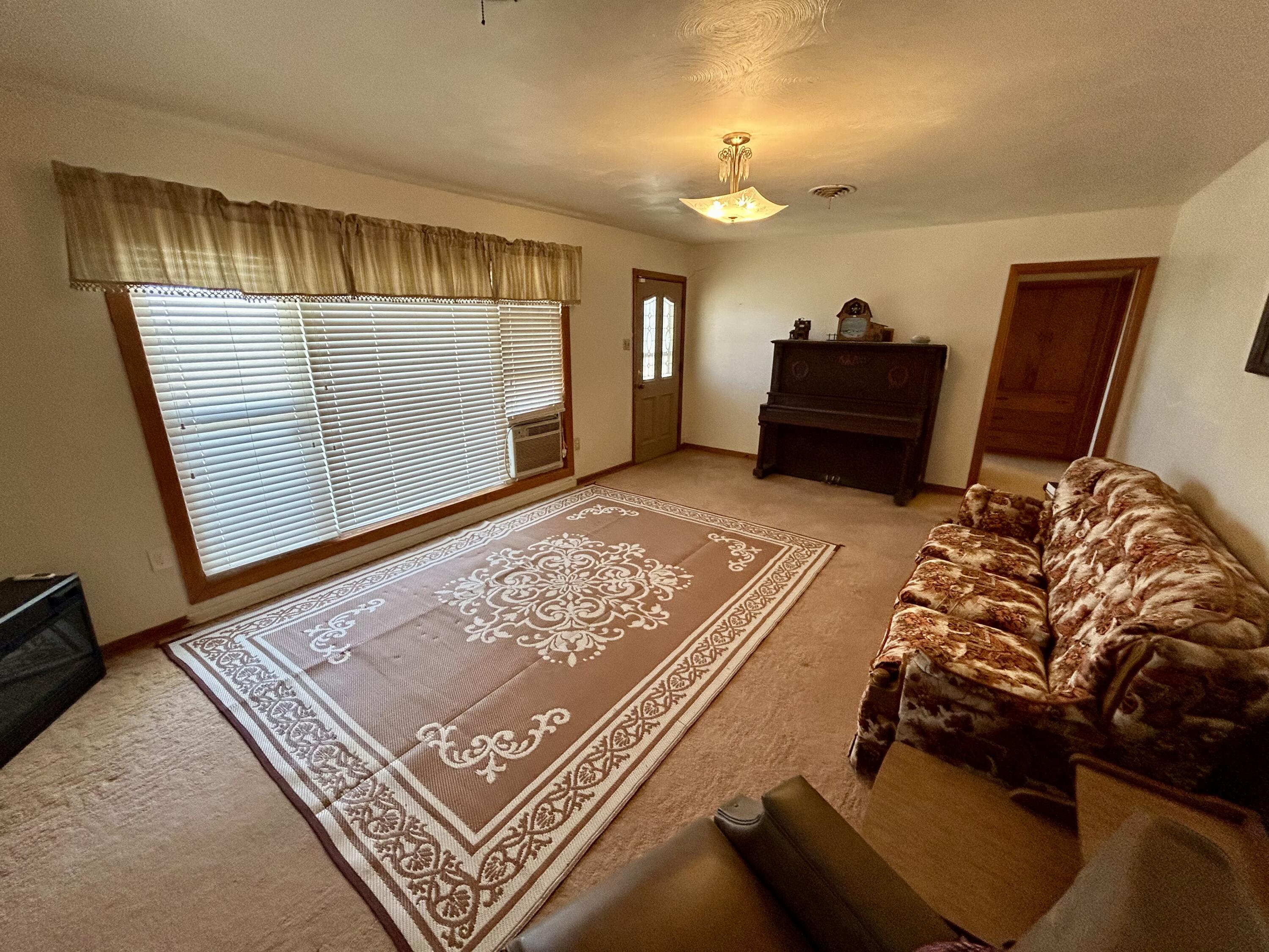 2101 Farm To Market 97 Lockney, TX 79241 - Photo 5 of 35 a living room with furniture