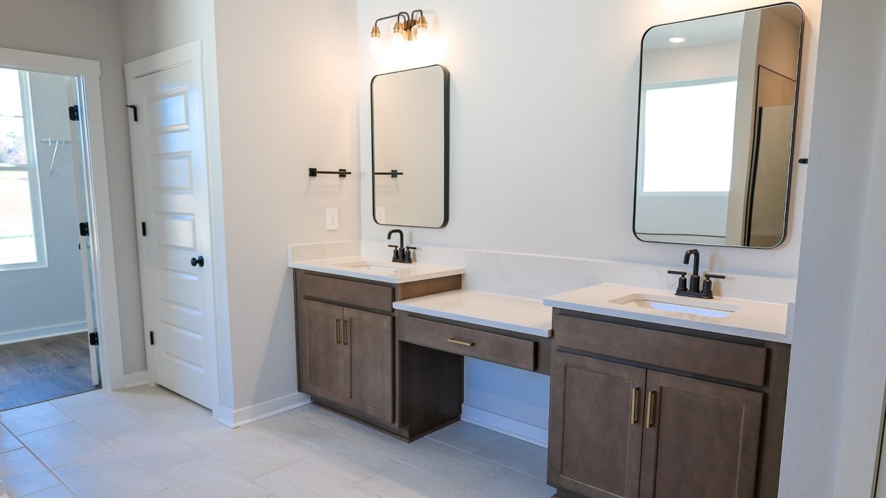 308 Harvest Point Boulevard Spring Hill, TN 37174 - Photo 32 of 91 a bathroom with a double vanity sink mirror and
