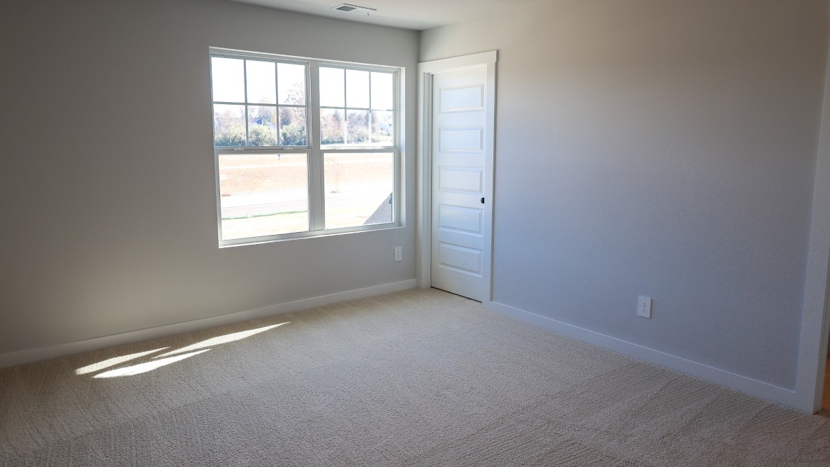 308 Harvest Point Boulevard Spring Hill, TN 37174 - Photo 59 of 91 an empty room with a window