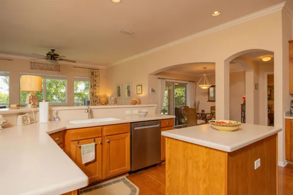a view of a backyard with sitting area