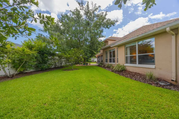 a view of staircase with white walls