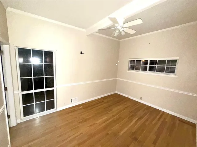 a bathroom with a sink a mirror and shower