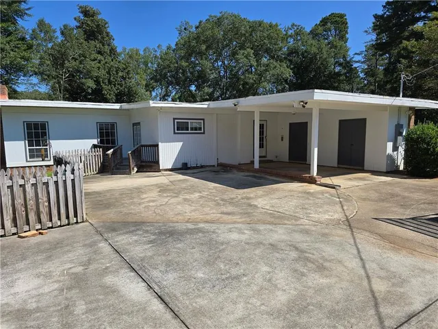 a view of a house with a patio