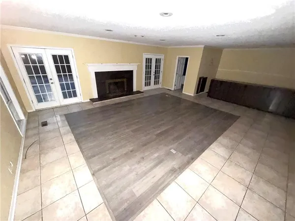 a view of an empty room and window