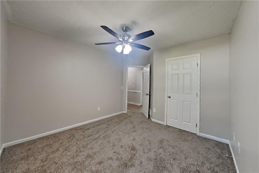 3013 Rockview Drive Loganville, GA 30052 - Photo 15 of 19 a view of an empty room