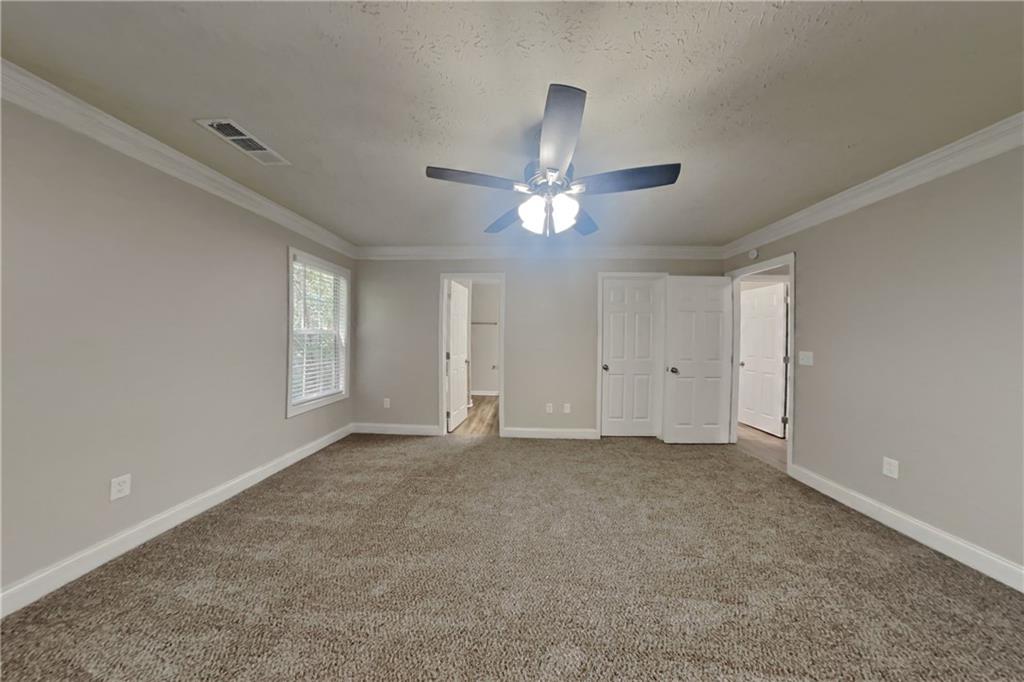3013 Rockview Drive Loganville, GA 30052 - Photo 10 of 19 a view of an empty room with a window
