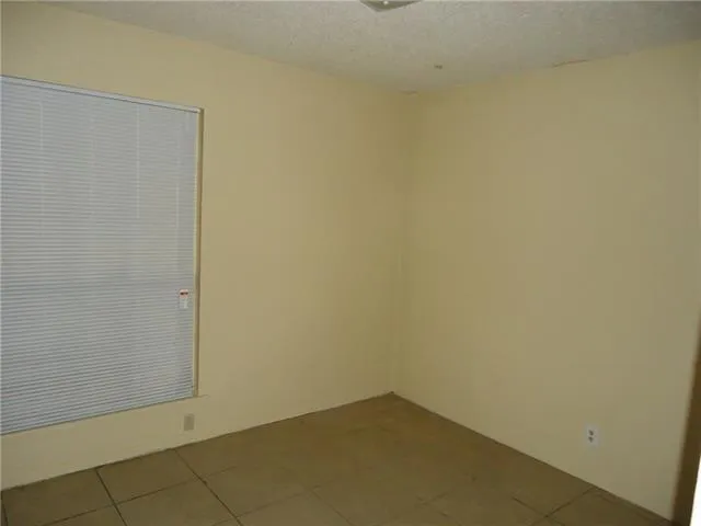 a bathroom with a sink and shower