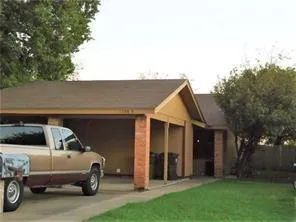 a car parked in front of a house