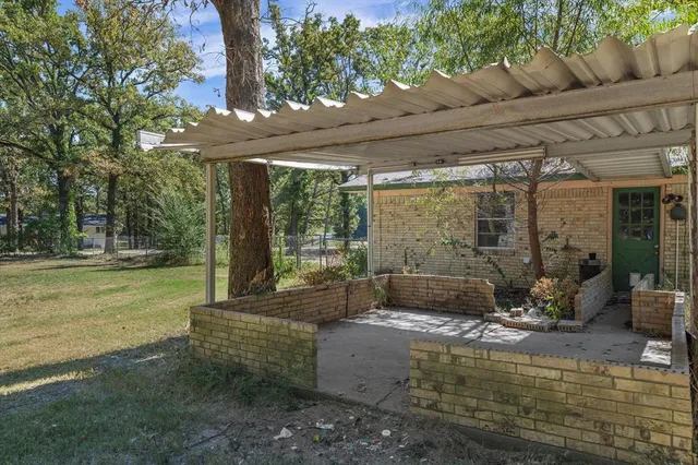a view of swimming pool with outdoor seating