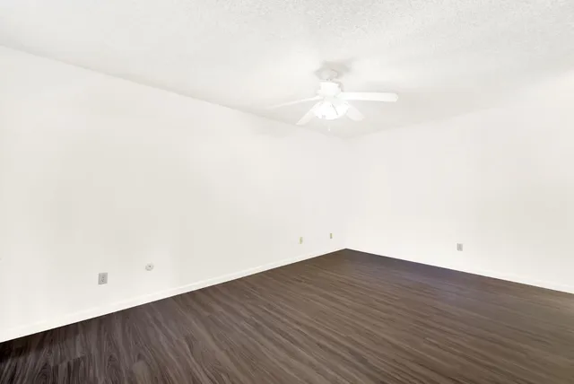 a view of a house with swimming pool in front of it