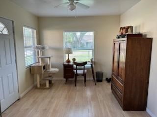 932 Walling Street Houston, TX 77009 - Photo 1 of 23 a view of a workspace with furniture and a window