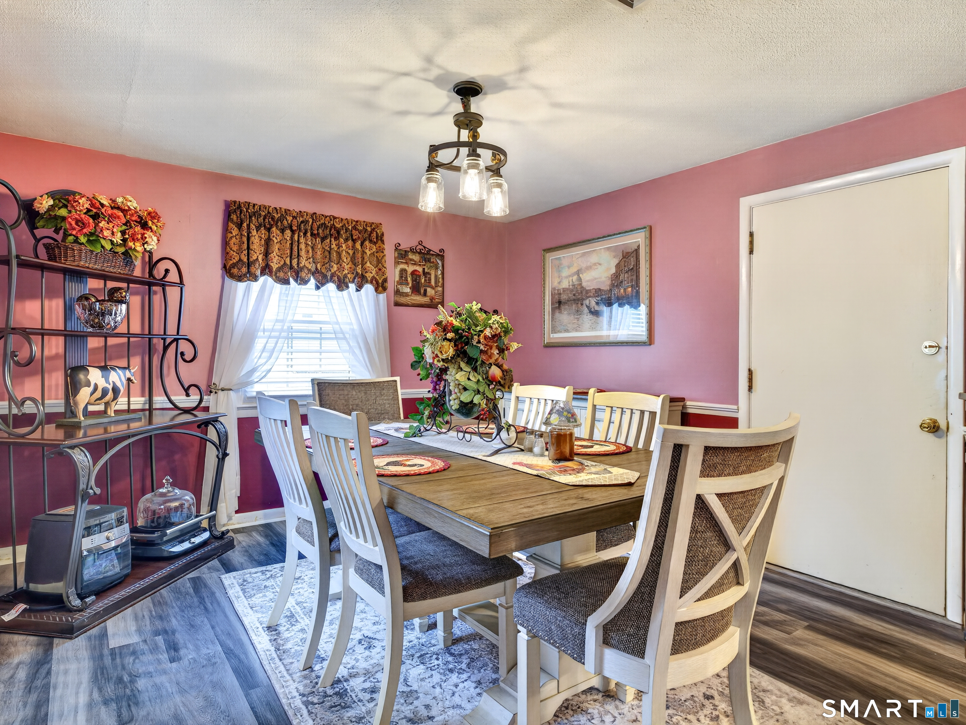 235 Scotland Road Norwich, CT 06360 - Photo 10 of 31 a view of a dining room with furniture and chandelier