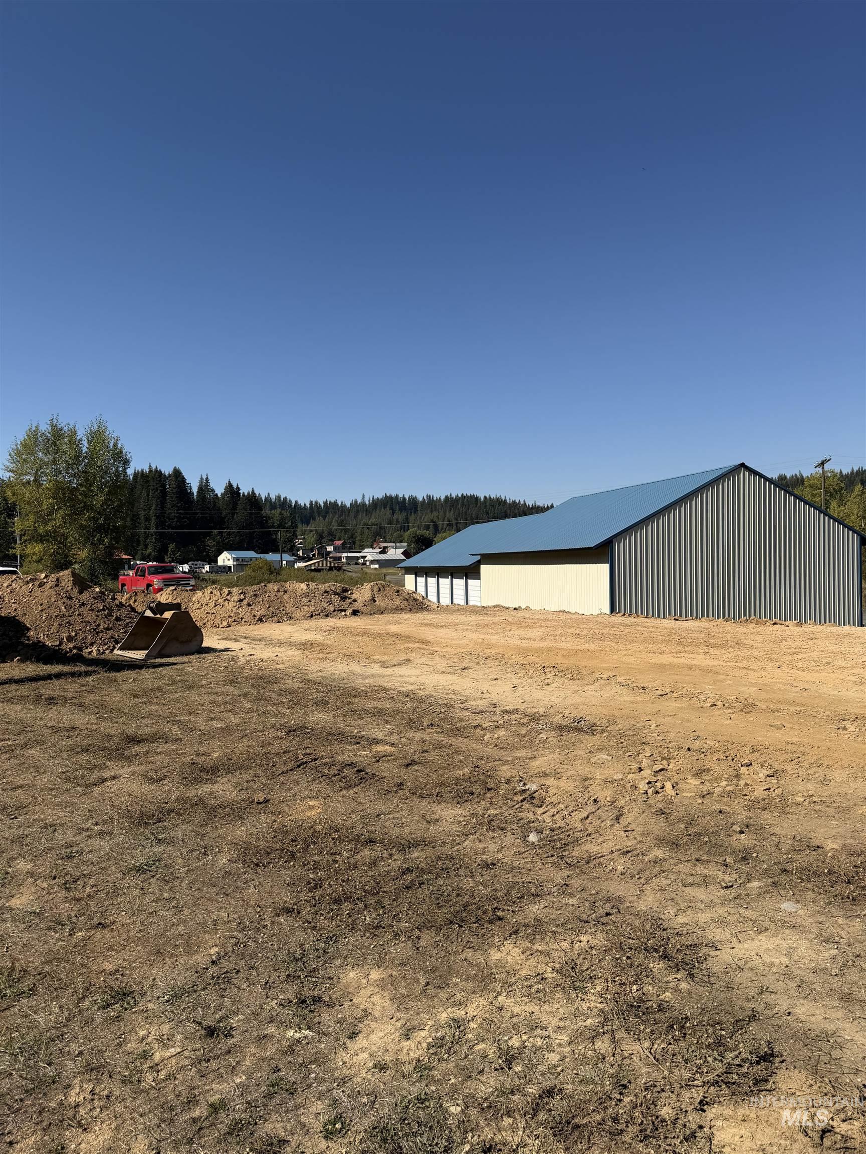 Tbd Dent Bridge Road Elk River, ID 83827 - Photo 7 of 23 View of yard featuring a pole building, an outbuilding, and a forest view