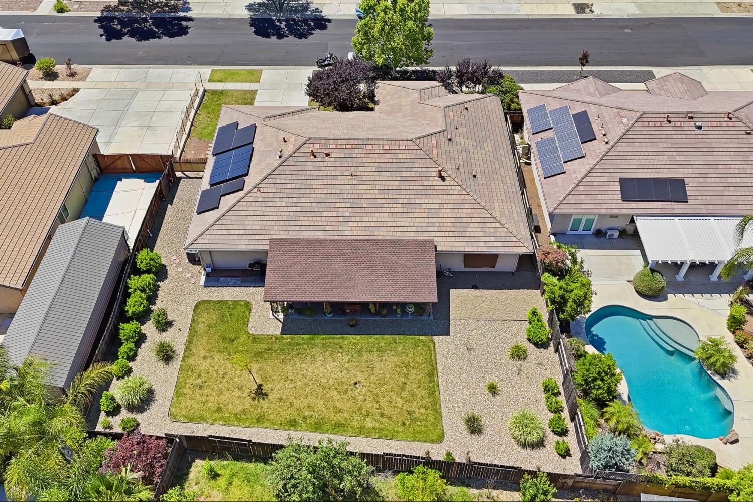 2011 Roy Ranch Way Plumas Lake, CA 95961 - Photo 43 of 49 an aerial view of a house with a swimming pool