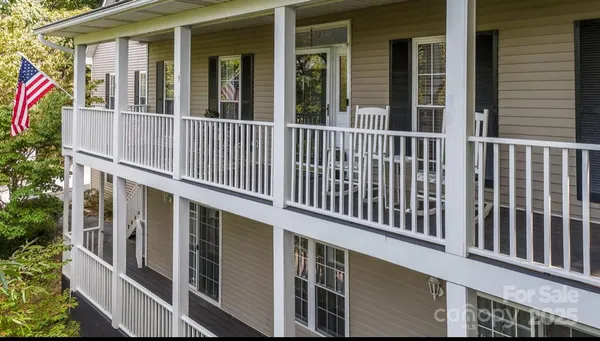 a view of a house with a deck