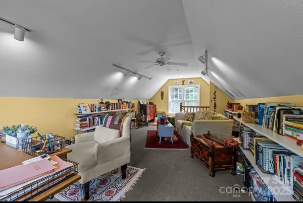 a view of a living room and a livingroom with furniture