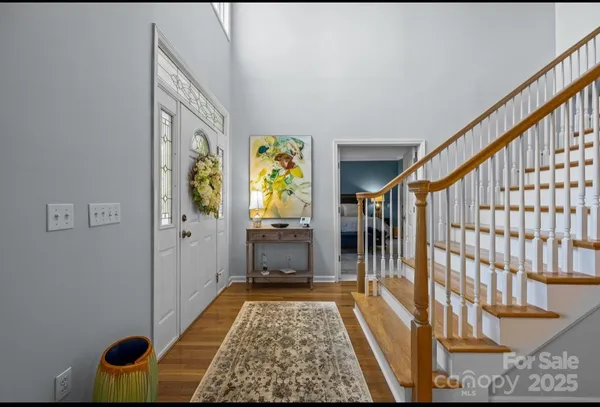 a bathroom with a tub and shower