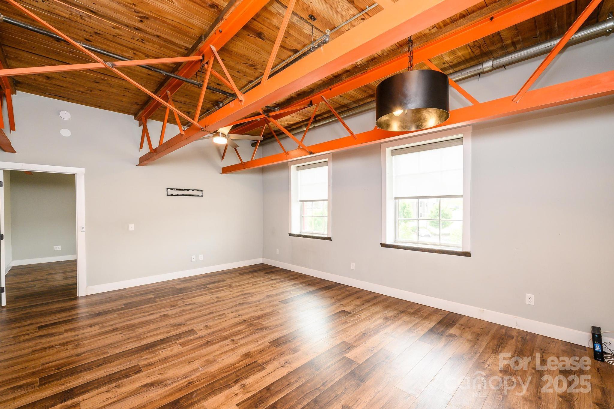 1001 West Avenue Northwest, Unit 1 Lenoir, NC 28645 - Photo 23 of 38 a view of a room with wooden floor